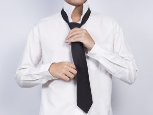 vilken färg på slipsen vid begravning